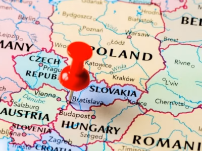 Map of Europe with a red pin over Slovakia for international company formation.
