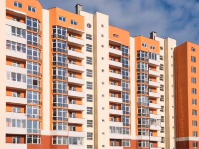 Residential building façade to illustrate the offence of neighbor harassment, or blocking, in communities.