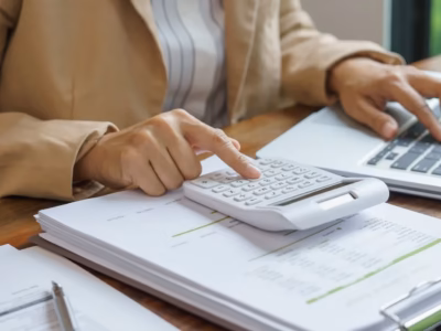 Person calculating cryptocurrency taxes for the 2025 tax return with expert legal advice.