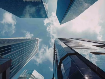 Facade of modern office buildings representing holding company structures and taxation.
