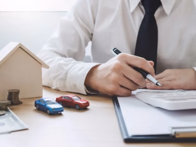 Lawyer calculating real estate asset taxes to apply the VAT exemption on tourist housing.