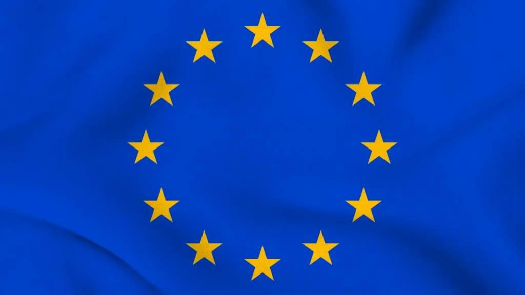 Bandera Unión Europea para ilustrar el uso del pasaporte MiCA desde España.