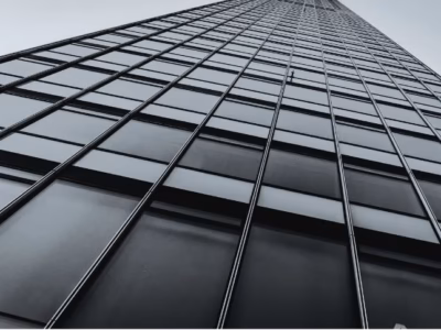 Black-and-white facade of a corporate building representing an organization’s legal structure.