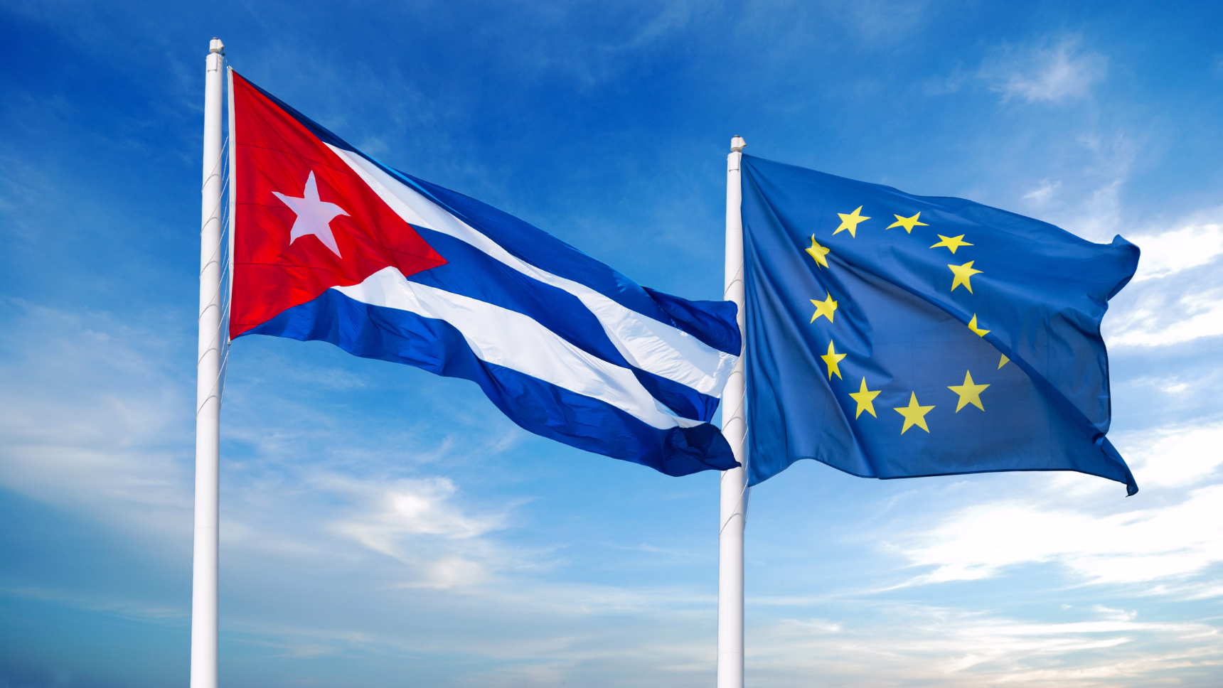 Banderas de Cuba y la Unión Europea en una página sobre pagos con criptomonedas
